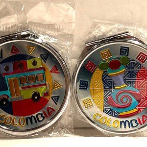 TWO SMALL COLOMBIA COMPACT MIRROR